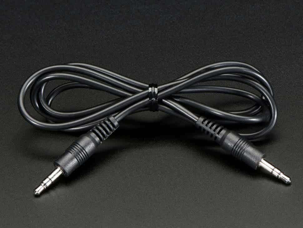 A 3.5mm headphone connector — a round metal pin